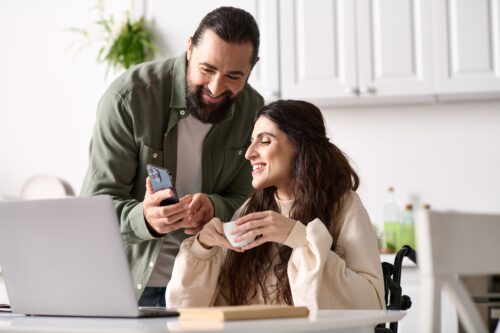 Image of Appealing,Loving,Couple,Of,Bearded,Man,And,Disabled,Woman,Looking